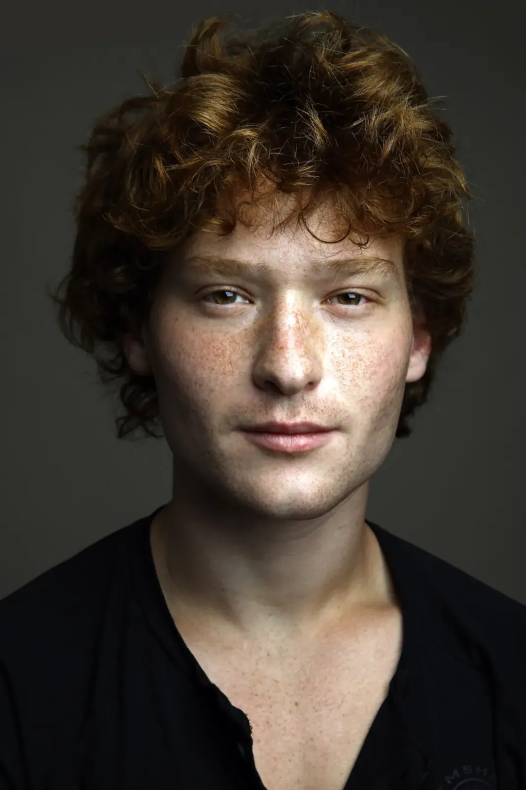 Neutral theatrical headshot
